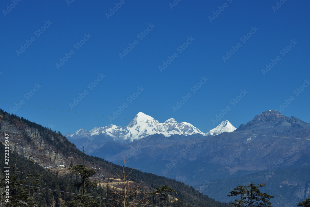 A view of Jomolhari 7326m in Bhutan through an idyllic valley
