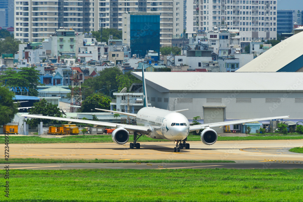 Airplane taxiing on runway of the airport Airplane taxiing on runway of the airport