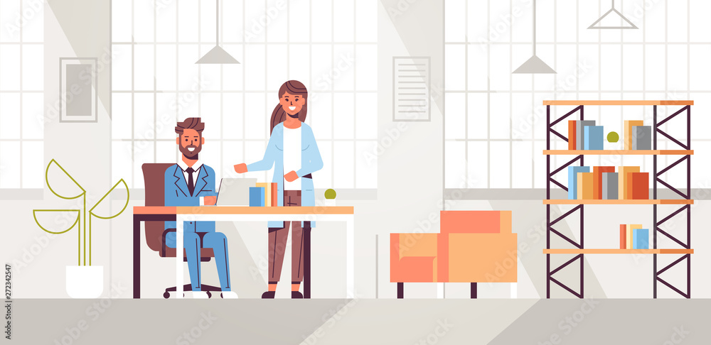 businessman with female assistant using laptop discussing new project during meeting at workplace teamwork concept creative workspace modern office interior flat full length horizontal