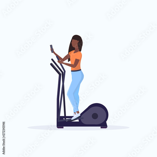 woman training on stepper treadmill african american girl using smartphone while working out gym digital gadget addiction concept flat full length white background