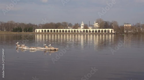 View of the Volkhov river and old Yaroslav court on April day. Veliky Novgorod, Russia photo