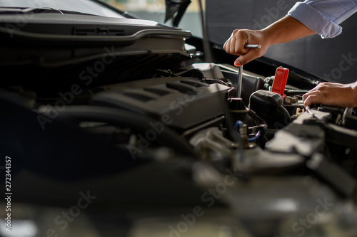 Wallpaper Mural Repair service car Auto mechanic working in garage car mechanic with wrench in garage Torontodigital.ca