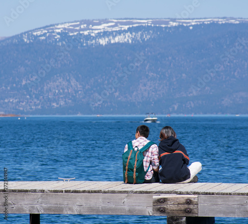 Couple looking out tahoe lake