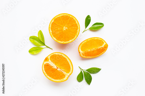 High vitamin C. Fresh orange citrus fruit with leaves isolated on white.