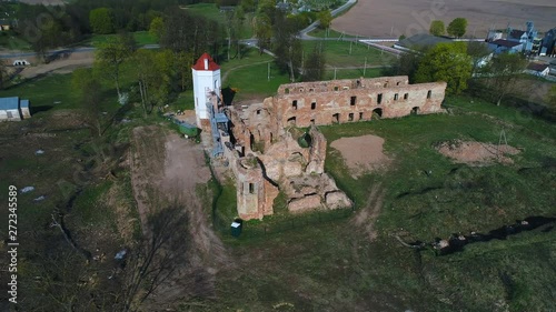 View from the height of the ruins of an ancient castle. Golshany, Belarus (aerial video)  photo