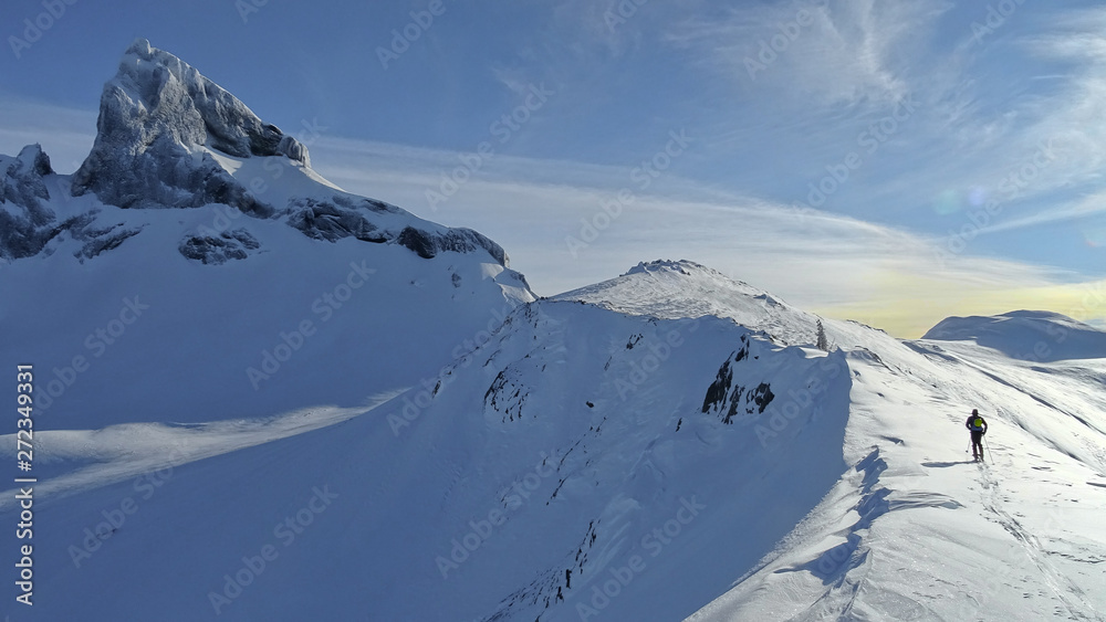 Lonely skier traversing BC Coastal mountains