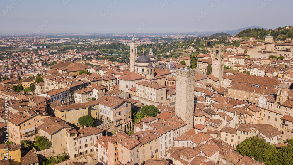 Bergamo, Italy. Amazing drone aerial view of the old town. Landscape at the city center, its historical buildings and the towers