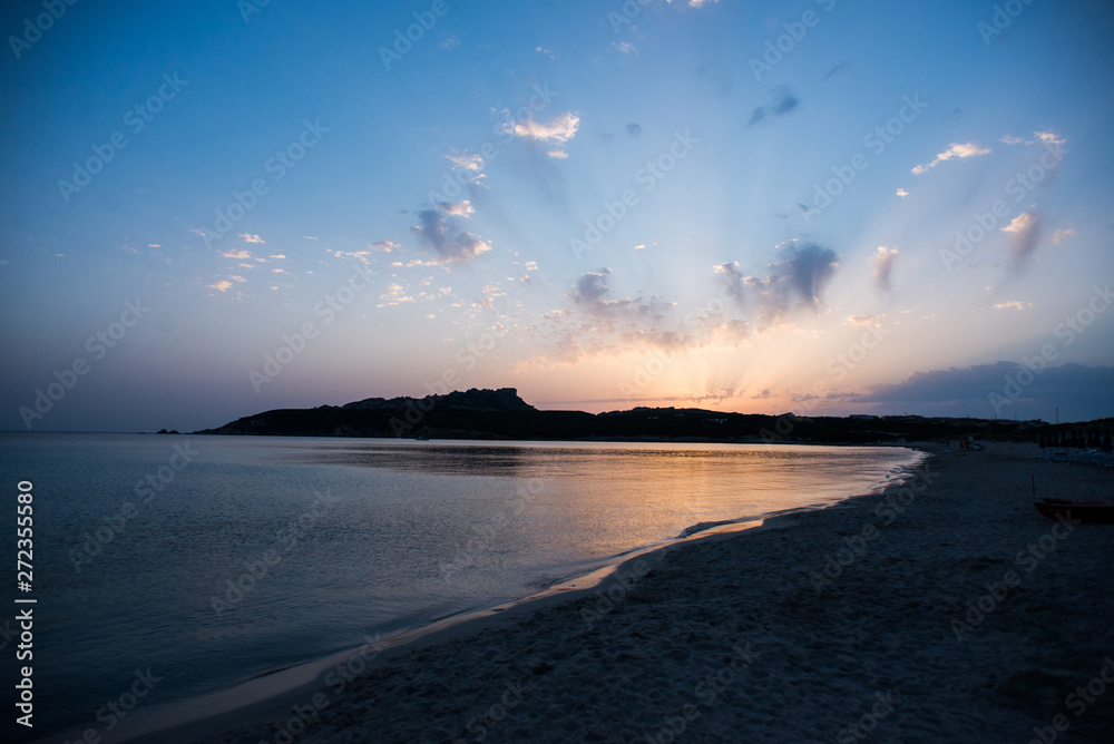 Sunset on the Beach of Rena di Ponente, Sardinia Island.