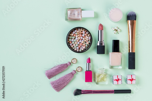 set of professional decorative cosmetics, makeup tools and accessory isolated on pastel background. beauty, fashion and shopping concept.beauty flat lay composition, top view.Copy space