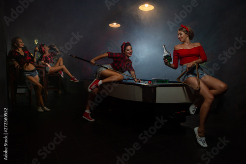 Pin up girls  having fun in nightclub © Oleg
