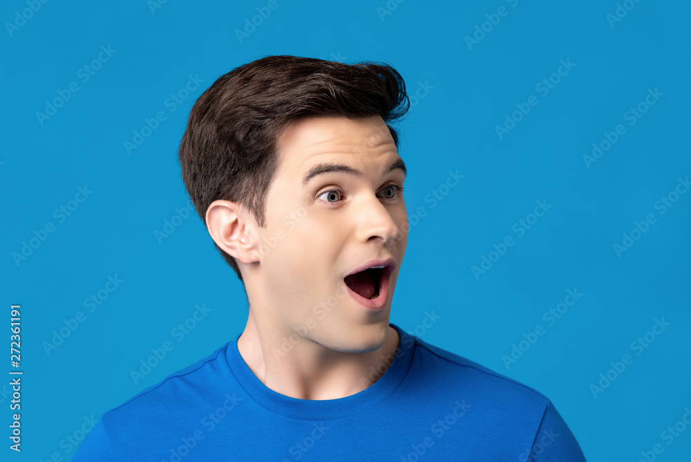 Surprised handsome man with open mouth