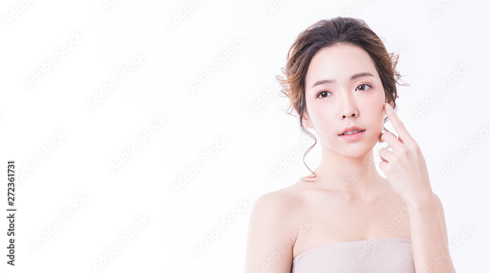 Closeup portrait of asian woman with fair perfect healthy glow skin isolated on white background, asian beautiful girl with pretty smile on her face. Beauty surgery concept banner Closeup portrait of asian woman with fair perfect healthy glow skin isolated on white background, asian beautiful girl with pretty smile on her face. Beauty surgery concept banner