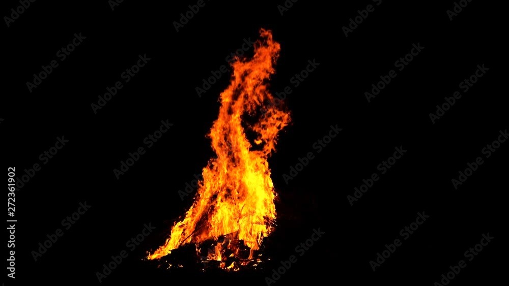 A large fire in the night sky Beautiful abstract background in the form of lights, light and life. A fiery orange on a black background in 4k A large fire in the night sky Beautiful abstract background in the form of lights, light and life. A fiery orange on a black background in 4k