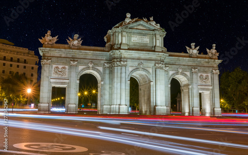 View of Puerta de Alcala at night with a starry sky, Madrid, Spain