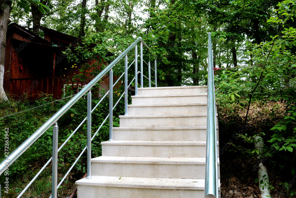 Stone staircase with iron railing Stone staircase with iron railing