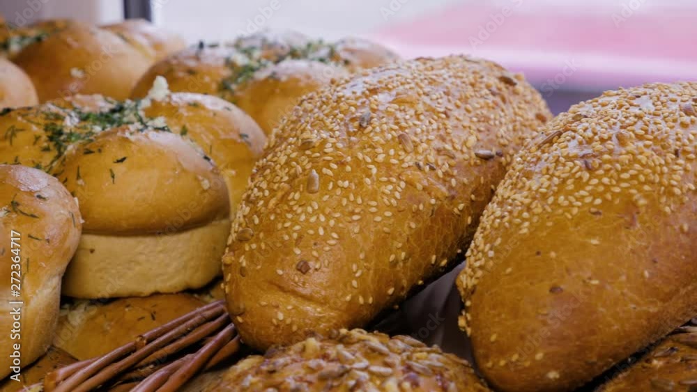 Breads and baked goods with seeds in basket, close-up. Breads and baked goods with seeds in basket, close-up.