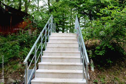 Stone staircase with iron railing
