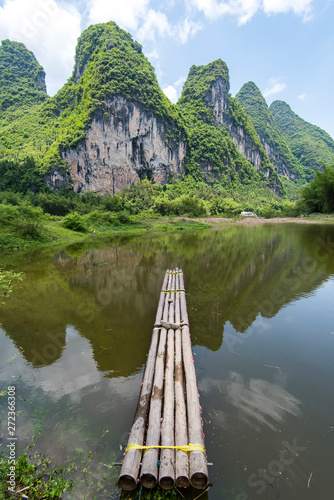 Bamboo rafts in idyllic li river scenery,Sunset landscapae of yangshuo in guilin,china photo