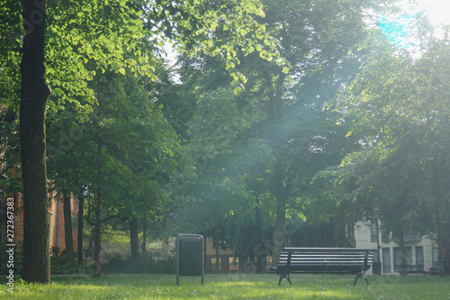 Obraz na płótnie park bench at sunset, in groningen, the netherlands w salonie