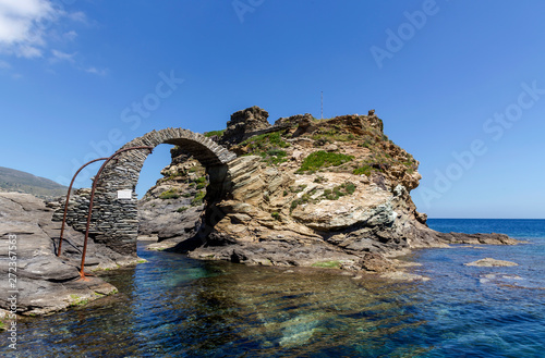 Fragment of the Kastro fortress and arched bridge on Andros Island (Greece, Cyclades) © TETYANA