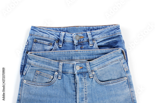 Stylish jeans pants on white background