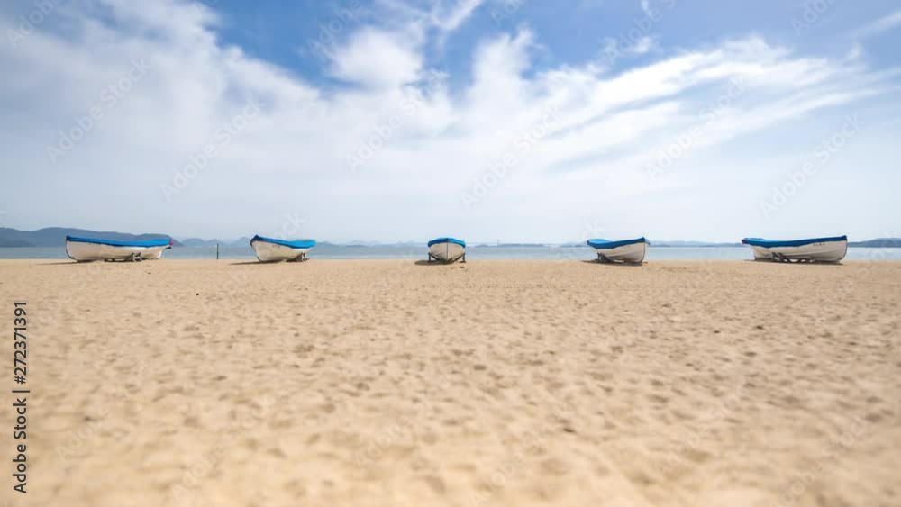Yacht and Blue Sky and Sandy Beach Timelapse Yacht and Blue Sky and Sandy Beach Timelapse