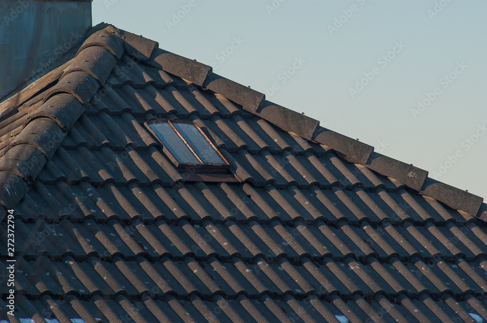 Roof window on an old building. Roof window on an old building.