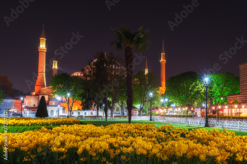 Sultanahmet, the Old City center of Istanbul at night, scenic cityscape, view of the park and Hagia Sophia (Aya Sofya), Fatih, Turkey. Outdoor travel background