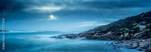 long exposure of waves breaking in a small bay in southern Norway.