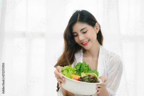 Beautiful Asian woman with healthy food. Heathy life style and Beautiful skin care food concept.