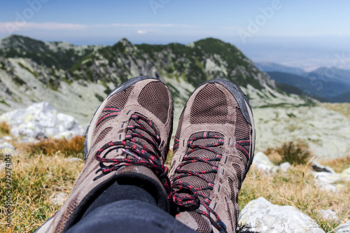 hiking shoes with mountains in background