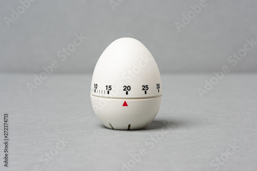 Egg timer  on grey background.