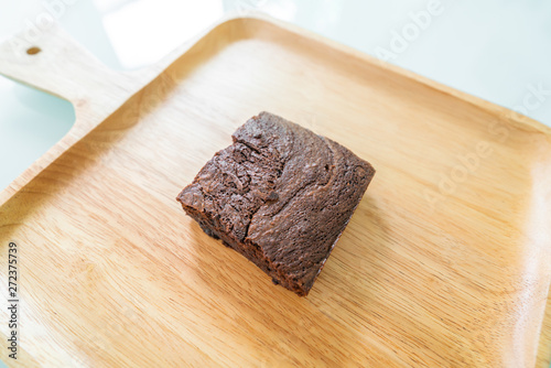 Chocolate brownies on wooden surface