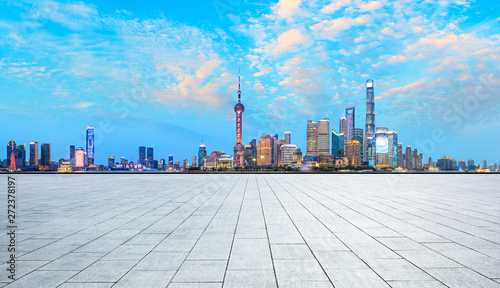 Shanghai skyline and modern city skyscrapers with empty floor at night,China