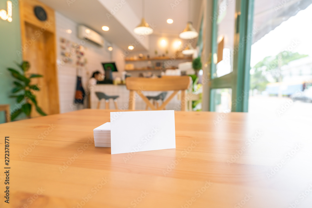 Blank business cards on wooden surface Blank business cards on wooden surface