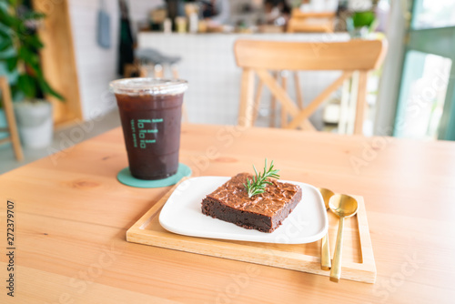Chocolate brownies on wooden surface