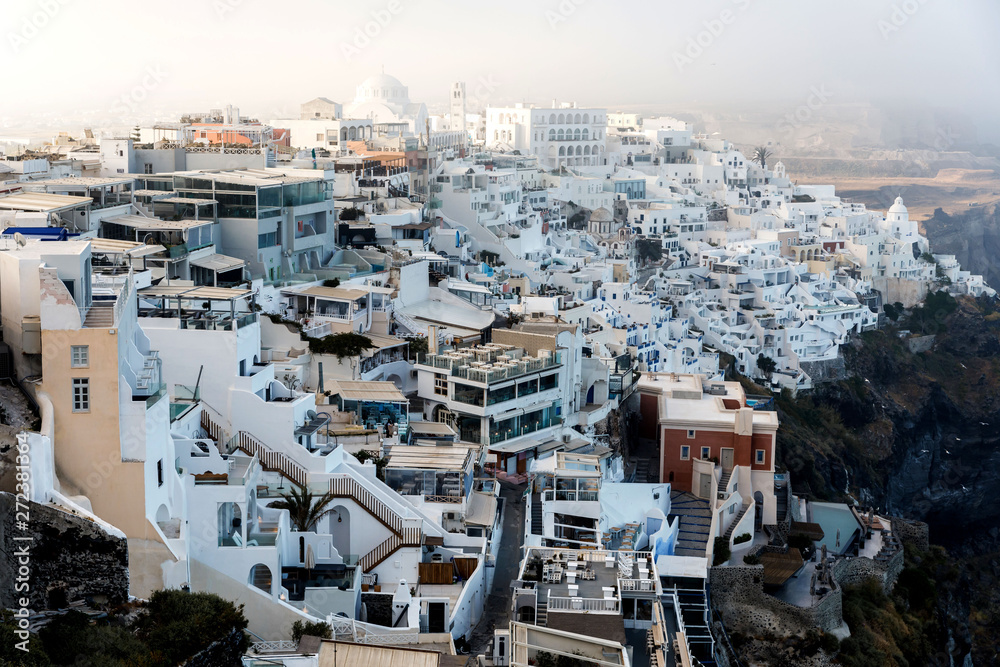Picturesque view of the city of Santorini. White buildings, sea, mountains. Romantic vacation
