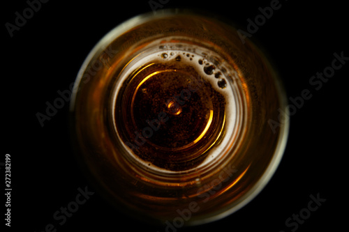 The Bottom Of The Glass Beer Mug On A Black Background