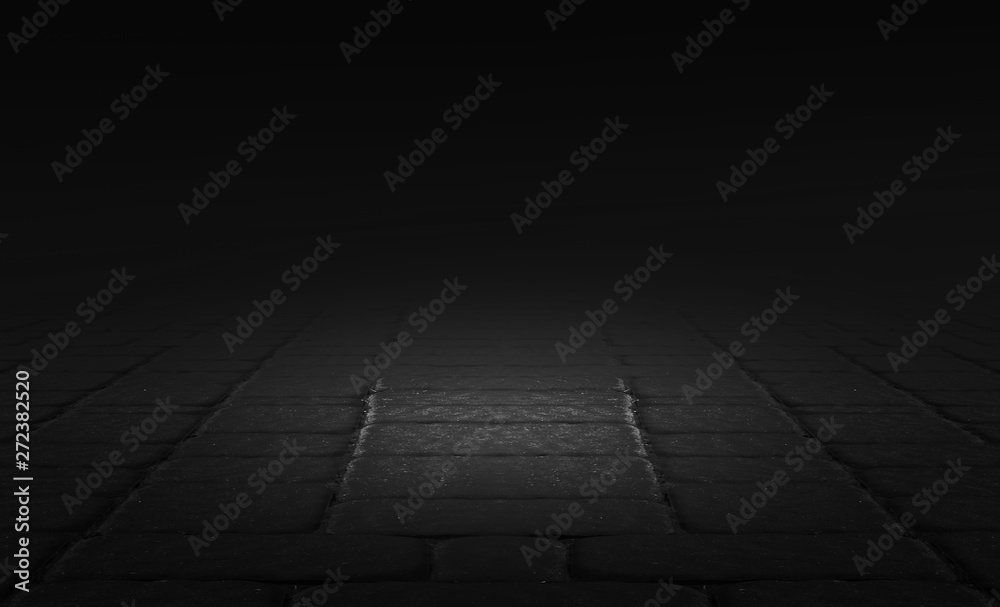 Empty background scene. Dark street reflection on the wet pavement. Rays  neon light in the dark, neon figures, smoke. Night view of the street, the city. Abstract dark background.