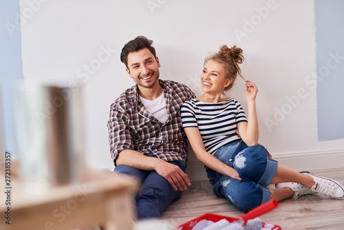 Young couple admiring home interior © gpointstudio