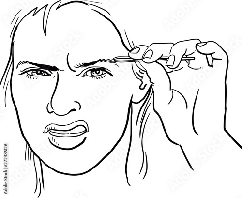 Woman plucks her eyebrows with tweezers