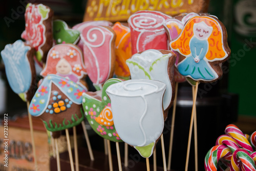 a variety of gingerbread cookies on a stick with images of different versions of drawings in the Park