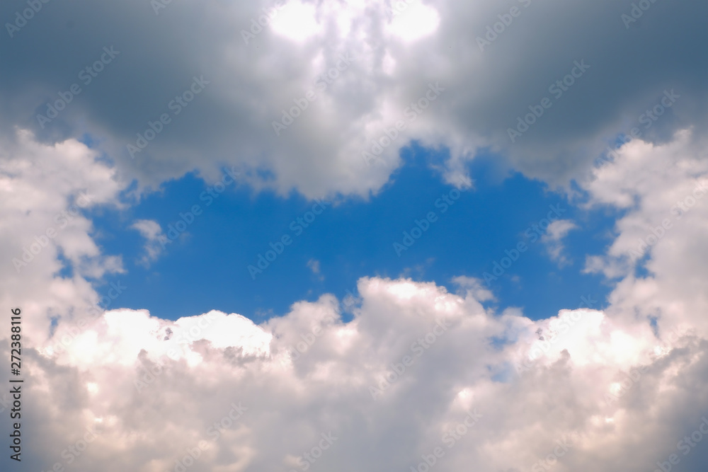 Fototapeta premium Clouds against a blue sky. Cloud frame.