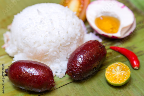 Philippine longganisa sausages with egg and rice photo