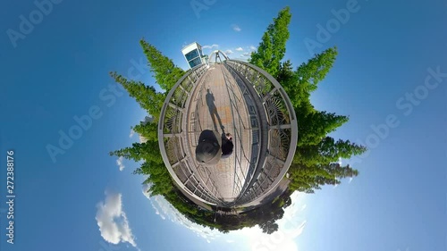 Ansan, South Korea - 07 june 2019 Walk in Ansan Waterside Park. Little Planet View with blue sky and green forest. photo