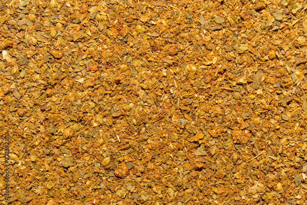 Photo of closeup texture of orange spice for meat and chicken, background Photo of closeup texture of orange spice for meat and chicken, background