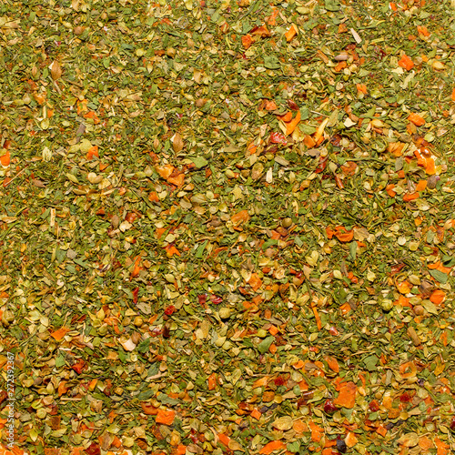 Photo of closeup texture of orange spice for garnish dishes and other food, background