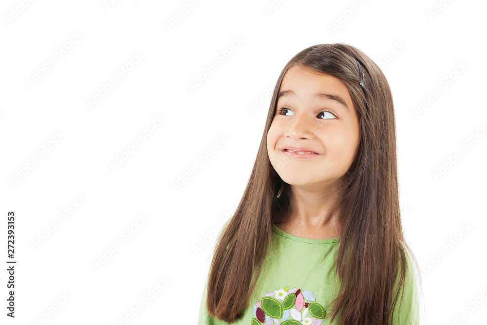 Happily surprised pretty little girl looking on copy space. Isolated on white background Happily surprised pretty little girl looking on copy space. Isolated on white background