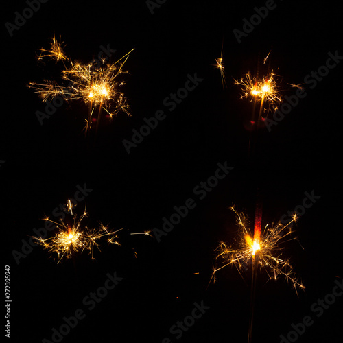 Decorative sparklers on black background
