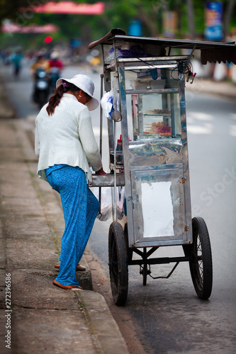 female oriental street vendor